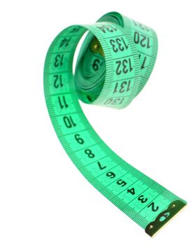 Measuring tape of the tailor green color. It is isolated on a white background