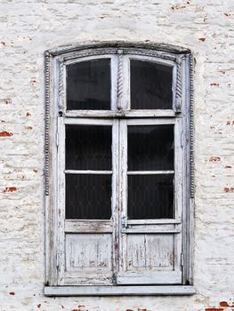 Vintage glass wooden door in church of ancient monastery