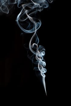 abstract smoke from black background. The abstract image of a smoke on a black background