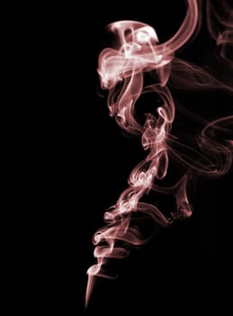 red smoke from black background . The abstract image of a smoke on a white background