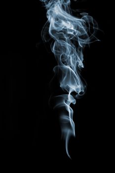 Smoke from black background. The abstract image of a smoke on a white background