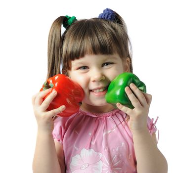 The little girl with color pepper. It is isolated on a white background