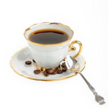 stylish coffee cup with silver spoon. A cup with a coffee drink. It is isolated on a white background