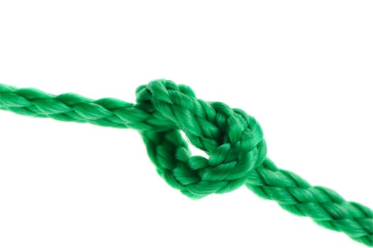 Knot on a cord. Isolated on a white background