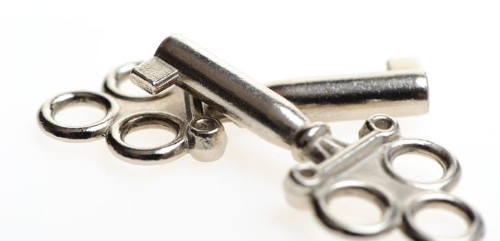 Decorative key. An iron key from the lock isolated on a white background