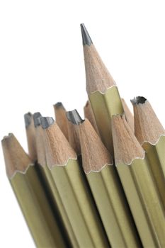 The whole and broken pencils. It is isolated on a white background