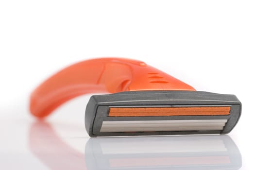 The disposable razor. The shaving machine tool isolated on a white background