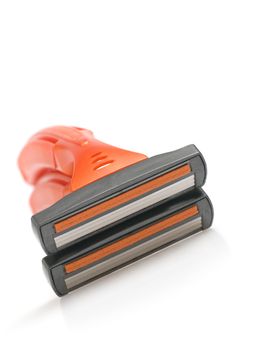 The disposable razor. The shaving machine tool isolated on a white background