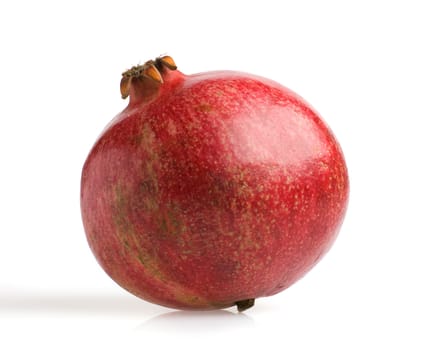 Pomegranate. Ripe fruit. It is isolated on a white background