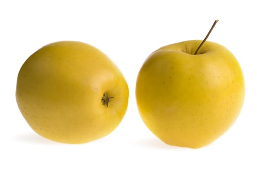 Ripe yellow apple. It is isolated on a white background