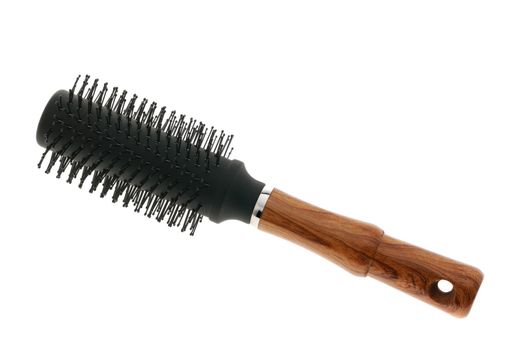 Hairbrush. The device isolated on a white background for combing