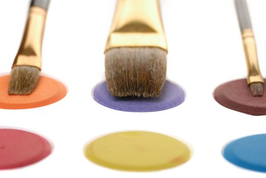 Paintbrush and paint. Brushes for drawing. C blur a color background