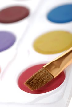 Paintbrush and paint. Brushes for drawing. C blur a color background