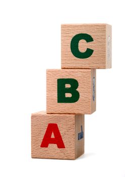 The alphabet. Letters drawn on wooden cubes. A children's toy