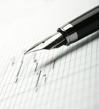 Business a theme. Diagrams from the share market, pens. Concept - exchange activity