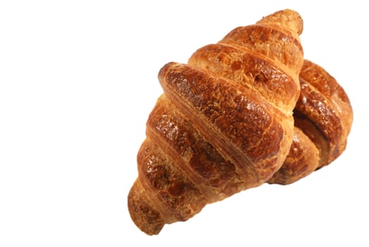 two croissant. A bakery product. A sweet roll it is isolated on a white background