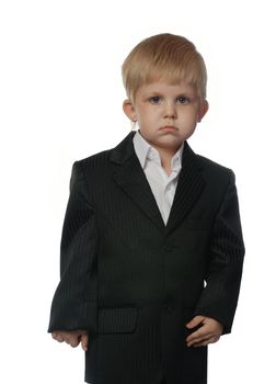 The boy in a suit. It is isolated on a white background. Age 3 years