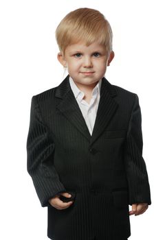 The boy in a suit. It is isolated on a white background. Age 3 years