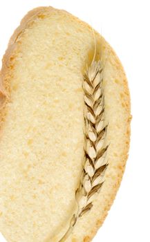 Wheat and cut bread. A ripe agriculture isolated on a white background