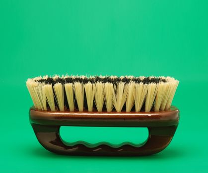 Brush for cleaning. The wooden handle, a natural bristle