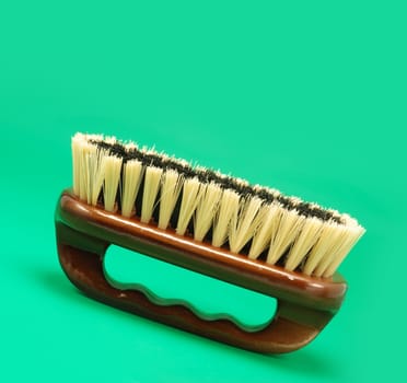 Brush for cleaning. The wooden handle, a natural bristle