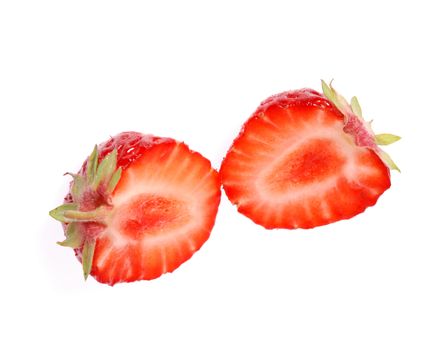 Strawberry cut. A berry isolated on a white background
