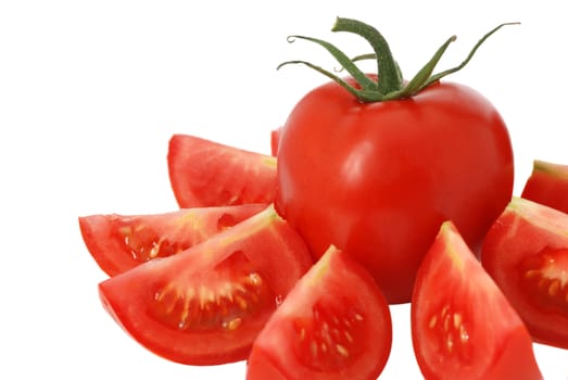 cut tomato isolated. It is isolated on a white background. A ripe vegetable.