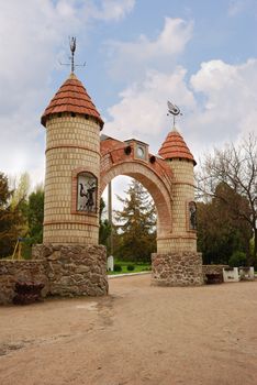 Gate. Fantastic columns - an input in children's park