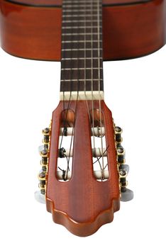 Acoustic six-string guitar. Covered by a brown varnish 