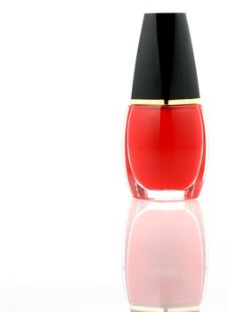 Nail polish. Red tubes with a black cap on a white background
