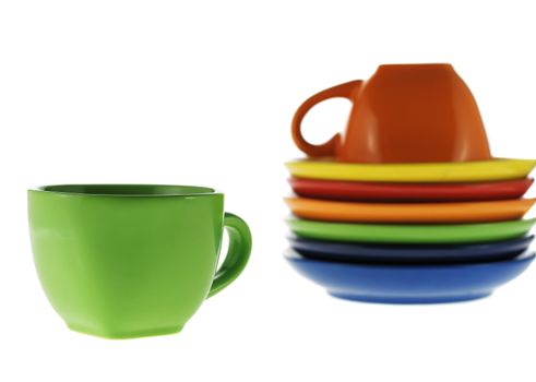 Normal and  turned color cups. Ceramic service from color cups