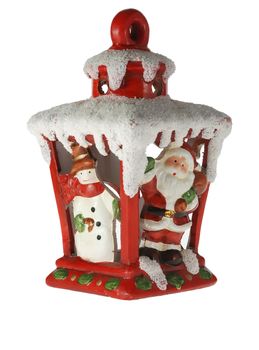 Christmas toy. A toy on a fur-tree with porcelain Santa Claus and snowman