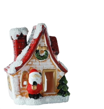 The house with Santa Claus on an input. A New Year's toy