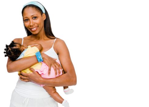 Portrait of a woman carrying her daughter and smiling isolated over white