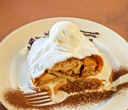 apple strudel tasty dessert dish at plate closeup