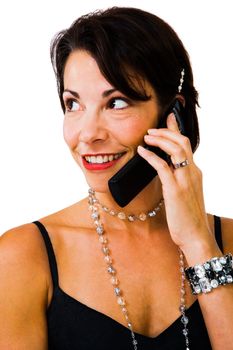 Close-up of a woman talking on a mobile phone isolated over white