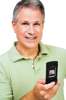 Happy man text messaging on a mobile phone isolated over white