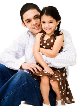 Brother hugging his sister and smiling isolated over white