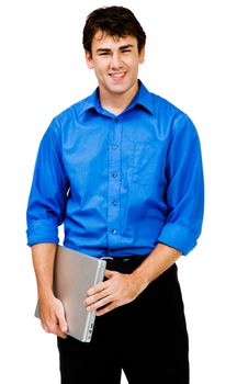 Happy young man holding a laptop and posing isolated over white
