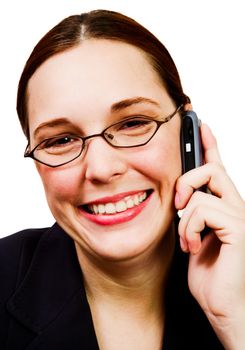 Gorgeous businesswoman talking on a mobile phone isolated over white