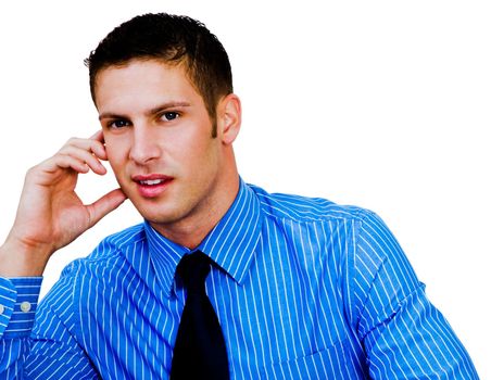 Latin American young man smiling and posing isolated over white