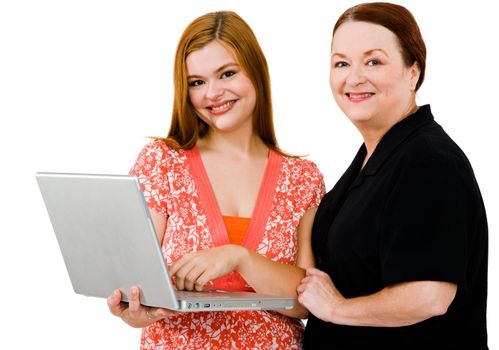 Happy women using a laptop isolated over white