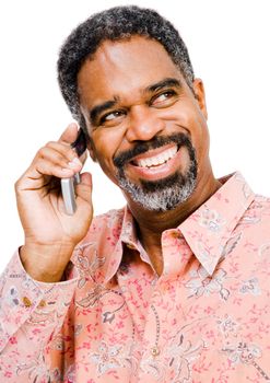 Close-up of a man talking on a mobile phone isolated over white