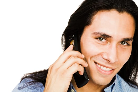 Portrait of a man talking on a mobile phone isolated over white