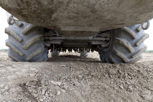 bottom view of heavy construction machine. lokking from the front under the machine