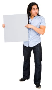 Portrait of a young man holding a placard isolated over white