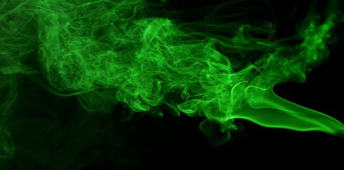 Smoke on black background with nice fancy wave patterns. Useful for abstract backgrounds