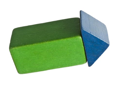 green and blue toy blocks building the shape of an arrow