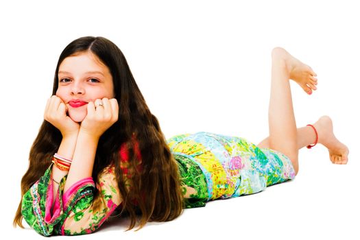 Lying girl posing and smiling isolated over white