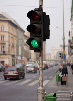 Green traffic light on an urban street